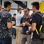 People talking at a networking event