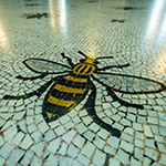 Bee on a mosaic floor
